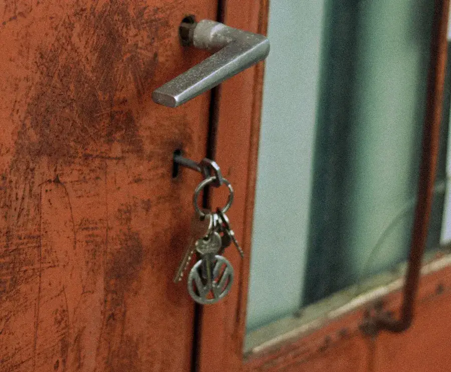 Keys hanging from an old door lock – checking BS 3621 and TS 007 locks in Lancing, Locksmith Lancing guide to five-lever lock markings