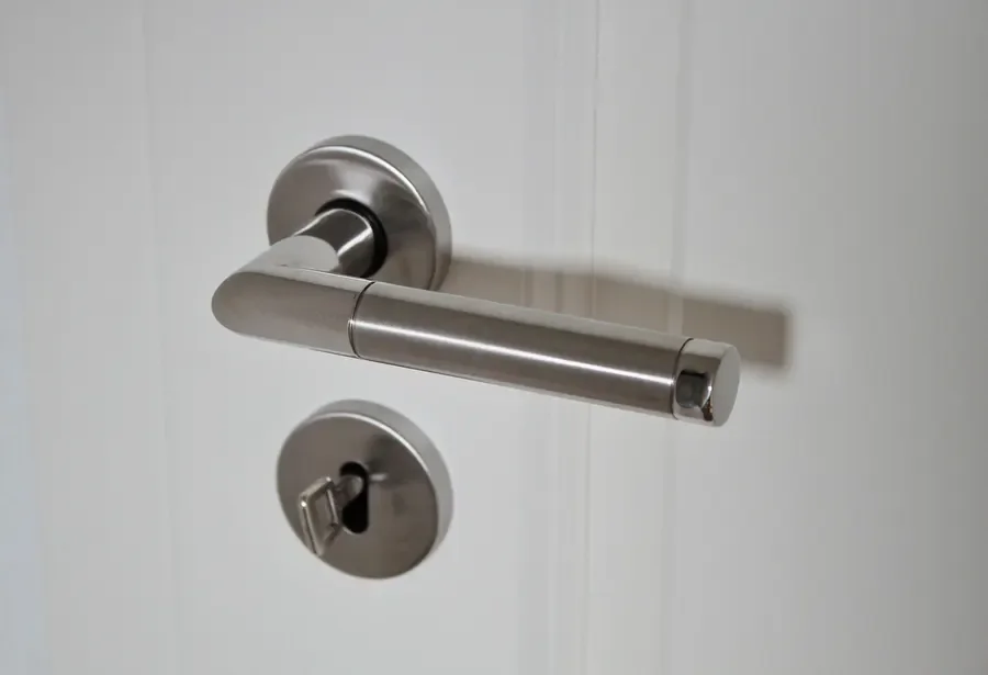Lever door handle with a thumb turn – the open-door test when your uPVC door won't lock in Lancing, Locksmith Lancing guide